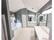 Spacious bathroom with a soaking tub, double vanity, and ample lighting, creating a spa-like atmosphere at 1890 Turtle Creek Way, Lawrenceville, GA 30043
