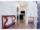 Inviting foyer with hardwood floors, and view into the open-concept living area at 1890 Turtle Creek Way, Lawrenceville, GA 30043