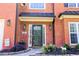 Elegant entryway with a decorative front door, brick facade, and manicured landscaping at 1890 Turtle Creek Way, Lawrenceville, GA 30043
