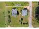 Aerial view showcasing a .31 acre lot with two existing structures and ample green space at 21 Elm St, Hampton, GA 30228
