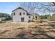 Large backyard with patio and deck is ready for your enjoyment at 1382 Bennett Rd, Grayson, GA 30017