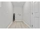 A clean laundry room ready for washer and dryer hookups at 1382 Bennett Rd, Grayson, GA 30017
