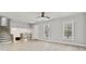 Spacious living room featuring stairs to the upper level at 1382 Bennett Rd, Grayson, GA 30017