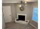 Cozy living space with a white brick fireplace, a modern lighting fixture, and stylish decor at 1382 Bennett Rd, Grayson, GA 30017