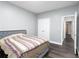 Bedroom with a comfortable bed and an open door way at 2221 Baker Carter Dr, Loganville, GA 30052