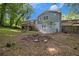 Spacious backyard with deck, fire pit, and ample space for outdoor activities and gatherings at 2950 Springfield Sw Ct, College Park, GA 30349