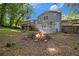 Inviting backyard with a cozy fire pit, perfect for gatherings and outdoor enjoyment at 2950 Springfield Sw Ct, College Park, GA 30349