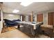 Spacious basement with a pool table, exercise machine, and storage, perfect for entertainment and hobbies at 2950 Springfield Sw Ct, College Park, GA 30349