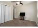 This bedroom has a closet, neutral walls, and a ceiling fan with lighting at 2950 Springfield Sw Ct, College Park, GA 30349