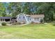 Landscaped front yard leads to an inviting home at 2950 Springfield Sw Ct, College Park, GA 30349