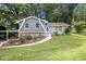 Charming home with a well-manicured lawn and beautiful flower beds enhancing its curb appeal at 2950 Springfield Sw Ct, College Park, GA 30349