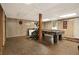Finished basement game room with a pool table and an elliptical machine at 2950 Springfield Sw Ct, College Park, GA 30349