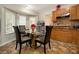 Eat-in kitchen features lots of natural light and honey oak cabinets at 2950 Springfield Sw Ct, College Park, GA 30349