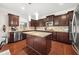 Modern kitchen with granite countertops, stainless steel appliances, and a center island at 337 Spotted Ridge Cir, Woodstock, GA 30188
