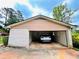 Spacious two-car garage with ample room for parking, featuring a brick exterior and convenient access at 792 Oneta Dr, Norcross, GA 30093
