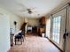 Spacious kitchen with tile floors, ceiling fan, cabinets, appliances, and access to the backyard at 792 Oneta Dr, Norcross, GA 30093