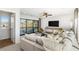 Cozy living room with plush sofa, balcony access, and stylish decor at 1107 Rivard Nw Cir, Atlanta, GA 30318