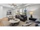 Modern living room with stylish furniture, hardwood floors, and ample natural light at 1107 Rivard Nw Cir, Atlanta, GA 30318