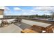 Relax on the roof deck with lounge chairs and a seating area, offering panoramic views at 1107 Rivard Nw Cir, Atlanta, GA 30318