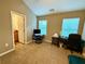 Bedroom with neutral walls, two windows, and carpet floors, suitable for an office at 2167 Del Lago Cir # 11, Kennesaw, GA 30152