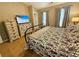 Comfortable bedroom with a large bed, natural light, and matching dressers for ample storage at 2167 Del Lago Cir # 11, Kennesaw, GA 30152