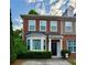 Charming brick townhouse with a well-maintained front yard and inviting entrance at 2167 Del Lago Cir # 11, Kennesaw, GA 30152