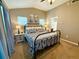 Serene main bedroom with neutral tones, a ceiling fan, and ample natural light at 2167 Del Lago Cir # 11, Kennesaw, GA 30152