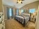 Peaceful main bedroom featuring neutral tones, a ceiling fan, and ample natural light at 2167 Del Lago Cir # 11, Kennesaw, GA 30152