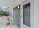 Charming home exterior featuring a light green facade, white trim, and covered entry for welcoming curb appeal at 246 Aurora Nw Ave, Atlanta, GA 30314
