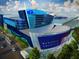 Architectural shot of the Georgia Aquarium, showing its striking blue and silver design at 246 Aurora Nw Ave, Atlanta, GA 30314