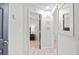 Bright hallway with stylish decor leading to multiple rooms, showcasing modern design and open flow at 246 Aurora Nw Ave, Atlanta, GA 30314