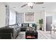 Bright living room featuring a comfortable sectional sofa, modern decor, and plenty of natural light at 246 Aurora Nw Ave, Atlanta, GA 30314