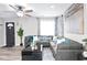 Comfortable living room with a large sectional sofa, stylish coffee table, and modern decor at 246 Aurora Nw Ave, Atlanta, GA 30314