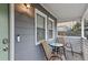 Inviting front porch with seating area, perfect for relaxing and enjoying the outdoors, featuring a video doorbell at 251 Aurora Nw Ave, Atlanta, GA 30314