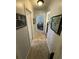 Hallway leading to a bedroom with gray walls and carpet at 2184 E Cherokee Dr, Woodstock, GA 30188