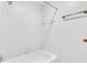 Clean white tiled shower-tub combination with white fixtures and hardware at 2702 Moorings Pkwy, Snellville, GA 30039