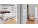 Inviting bedroom features hardwood floors, a ceiling fan, and a calming view at 2702 Moorings Pkwy, Snellville, GA 30039