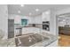 Bright kitchen with white cabinets, stainless steel appliances, and granite countertops at 2702 Moorings Pkwy, Snellville, GA 30039