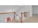 Bright foyer with a staircase, white railing, and a chandelier light fixture at 2702 Moorings Pkwy, Snellville, GA 30039