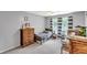 Bedroom featuring two beds, a wood dresser, and natural lighting from the window at 329 Kyles Cir, Hiram, GA 30141