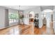 Dining room with wood floors, chandelier, and view of the kitchen at 329 Kyles Cir, Hiram, GA 30141