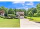 Charming two-story home with well-manicured lawn and attached two-car garage at 329 Kyles Cir, Hiram, GA 30141