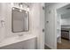 Bright bathroom features white vanity, modern mirror, and stylish lighting fixtures at 510 Northridge Crossing Dr, Sandy Springs, GA 30350