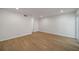 Spacious bedroom with modern lighting and wood flooring at 510 Northridge Crossing Dr, Sandy Springs, GA 30350