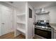 Modern kitchen with stainless steel appliances and pantry at 510 Northridge Crossing Dr, Sandy Springs, GA 30350