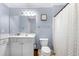Well-lit bathroom with vanity and bathtub shower combo at 1850 Cotillion Dr # 4419, Atlanta, GA 30338