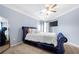 Bedroom featuring a blue bed with a plush headboard and white bedding at 1850 Cotillion Dr # 4419, Atlanta, GA 30338