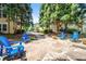 A communal patio with Adirondack chairs at 1850 Cotillion Dr # 4419, Atlanta, GA 30338