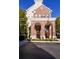 Beautiful doorway into a multi-story brick condo complex with classic architectural details at 1850 Cotillion Dr # 4419, Atlanta, GA 30338
