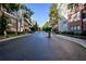 Upscale condos line a well maintained street with professional landscaping and classic architecture at 1850 Cotillion Dr # 4419, Atlanta, GA 30338